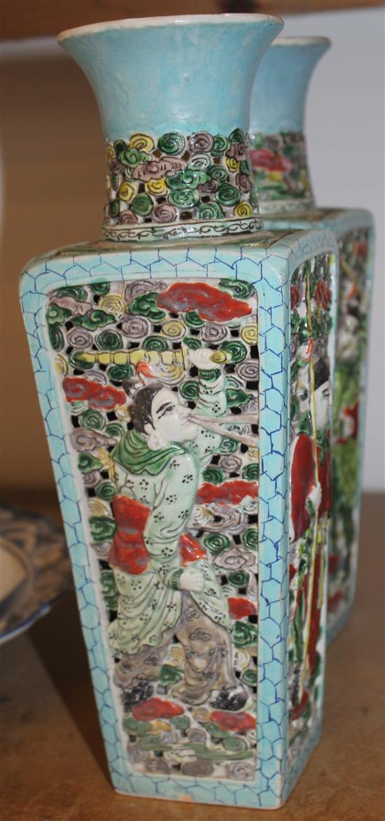 A pair of Chinese glazed biscuit porcelain double walled vases, Qianlong marks, late 19th century, 28.5cm, restored necks